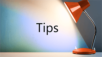 A light shining on the word "Tips"