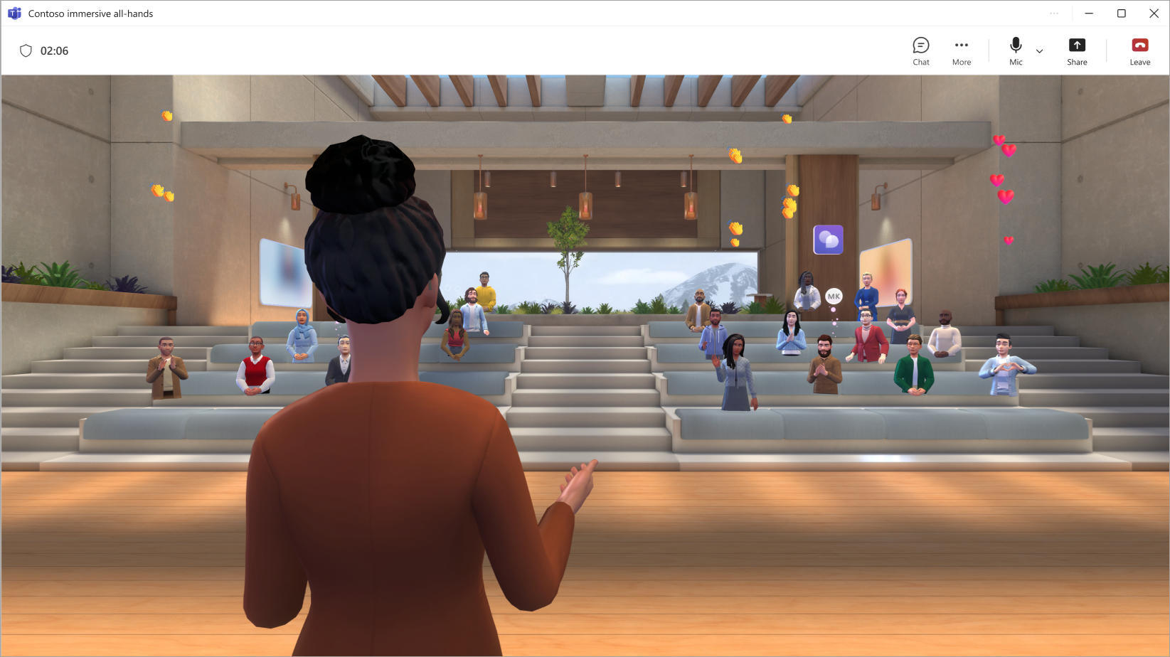 Screenshot showing avatars sitting at a screen sharing presentation in an immersive event.
